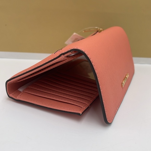 MICHAEL KORS JET SET TRAVEL LARGE TRIFOLD WALLET SHERBERT COLOR
NWT - Picture 15 of 16